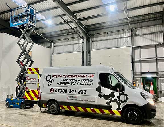 White Van carrying Out LOLER inspections on a scissor lift