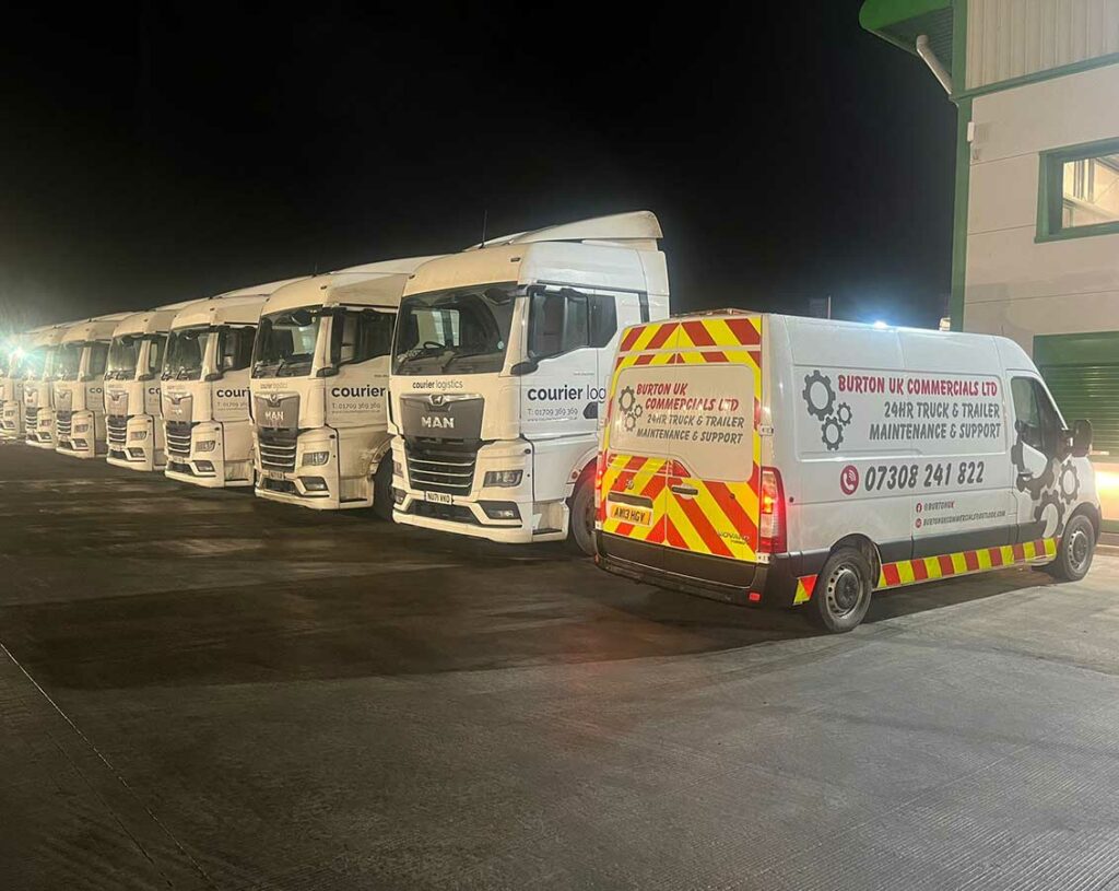 Burton commercials van next to a line of HGV lorries for fleet inspection